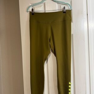 Nike Dri-Fit olive green leggings. Elastic waist. Inside back pocket.